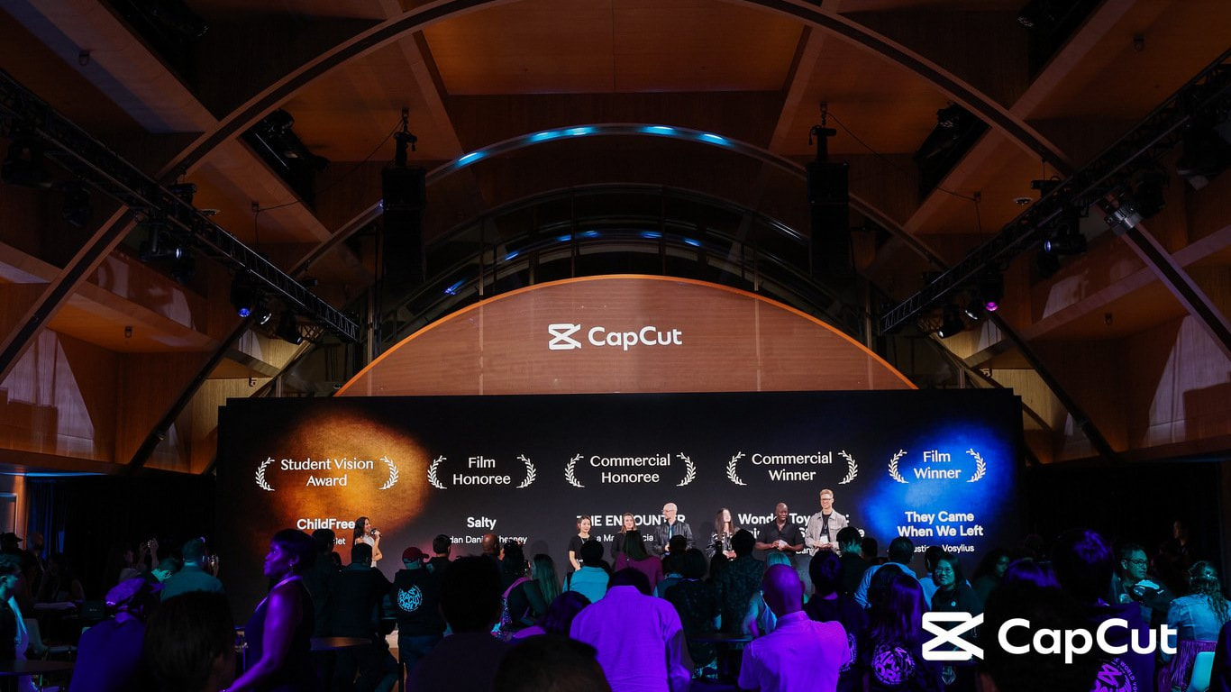 The CRE[AI]TE Awards stage at CapCut World Los Angeles, with the Commercial Winner laurels for Wonder Toy Store on the screen and winners on stage.